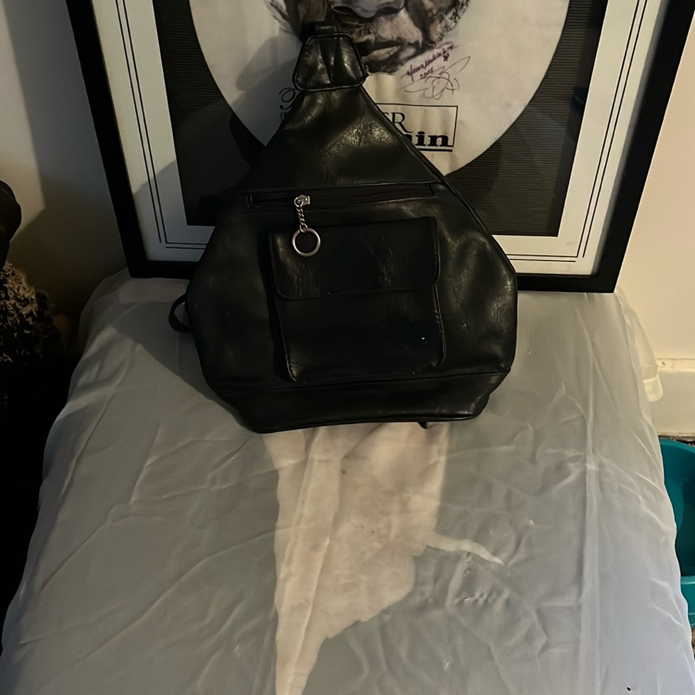 Black, women’s purse book bag style